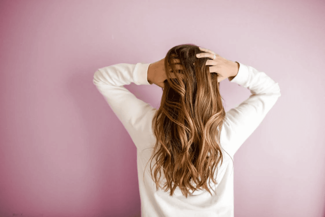 Person touching its hair