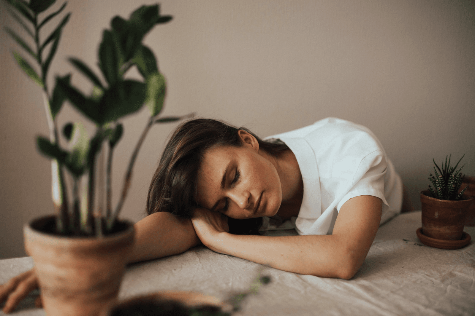 person sleeping on table
